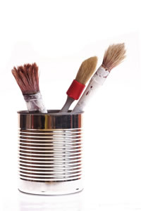 paint brushes in a can